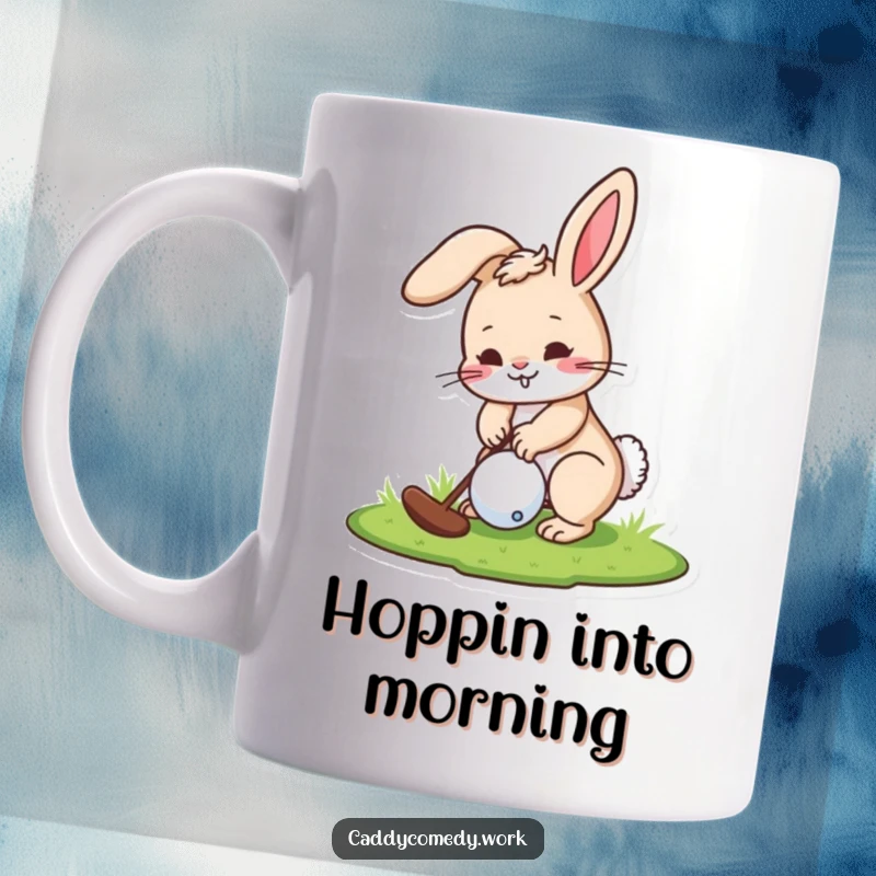 Funny mug featuring a playful rabbit character focused on putting a golf ball into the cup.